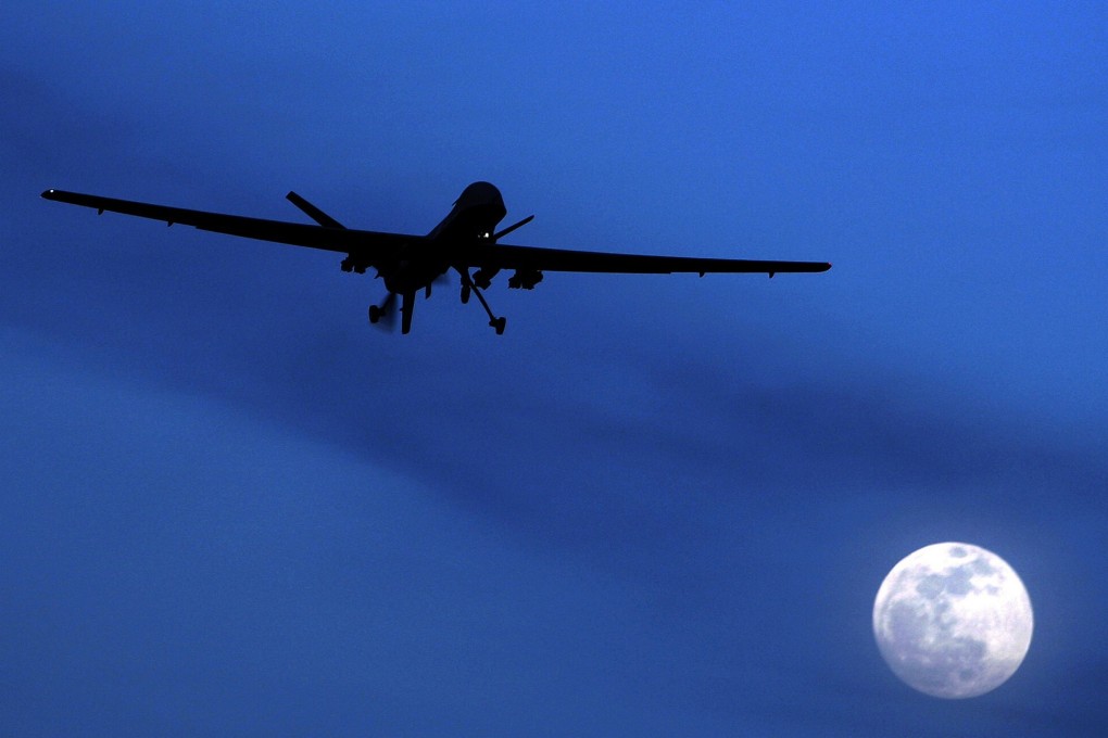 An unmanned US Predator drone flies over Kandahar Air Field in southern Afghanistan. Photo: “AP