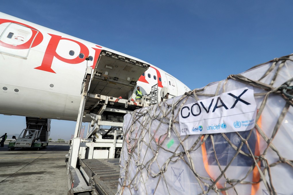 Ethiopian Airlines staff unload AstraZeneca vaccines from a cargo plane at Bole International Airport in Addis Ababa, Ethiopia, on March 7. As rich countries hoard vaccines, the Covax programme has only distributed 77 million doses to some of the world’s poorest people so far. Photo: Reuters