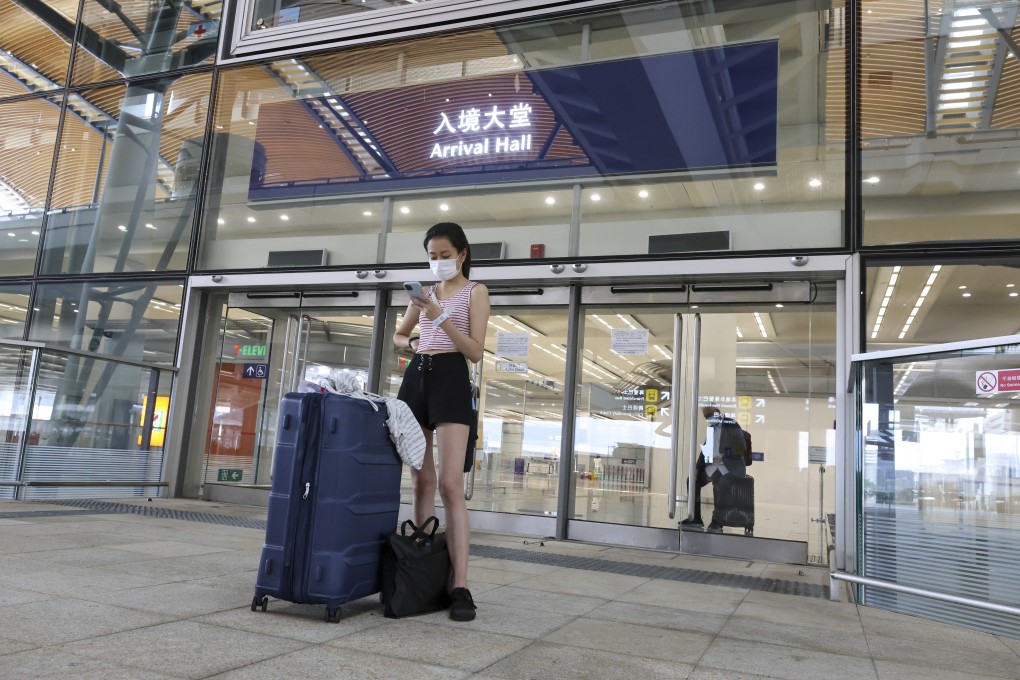 People return to Hong Kong at the Hong Kong-Zhuhai-Macau Bridge immigration tower on Wednesday. Photo: May Tse