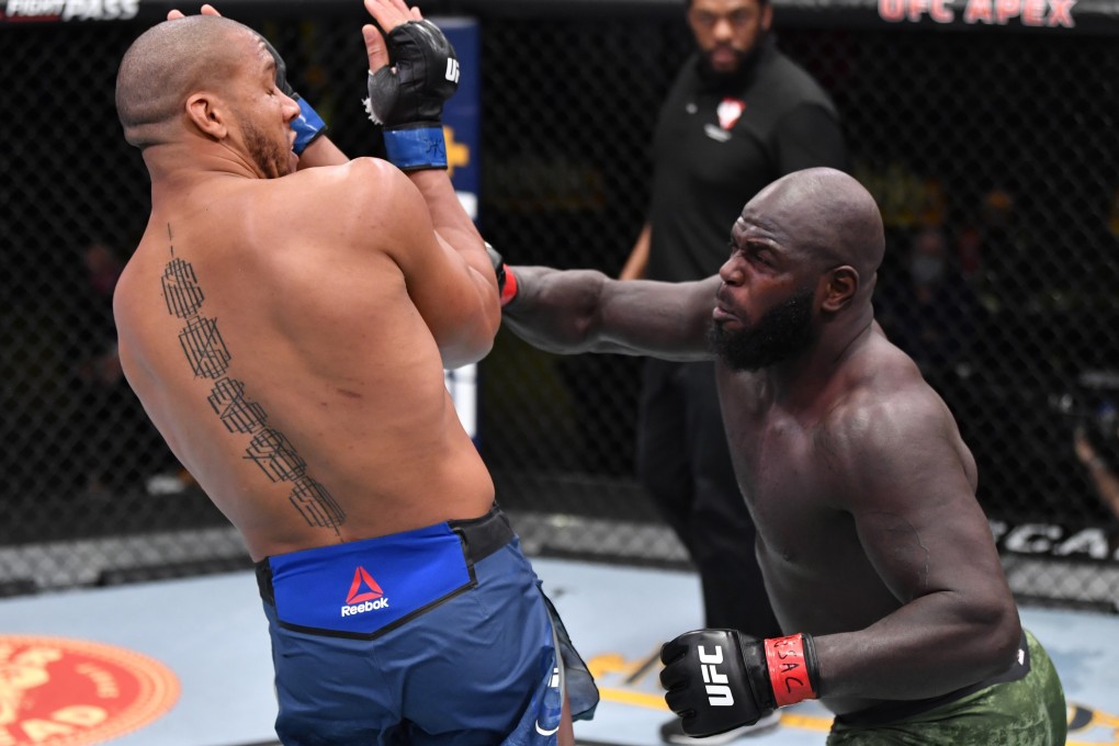 Jairzinho Rozenstruik punches Ciryl Gane in their heavyweight bout during at UFC Vegas 20. Photo: Jeff Bottari/Zuffa LLC