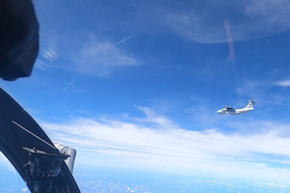 A plane with a Chinese flag on its tail in a picture supplied by the Royal Malaysian Air Force on Monday. Photo: Reuters