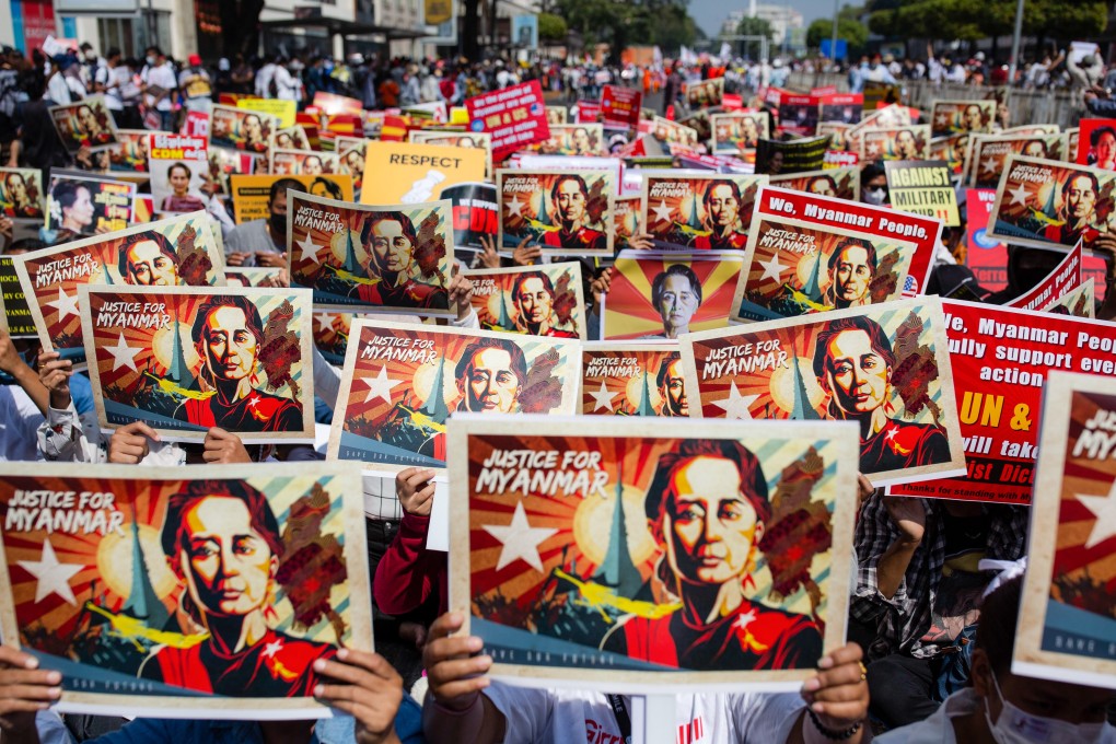 Protesters hold portraits of Myanmar’s ousted civilian leader Aung San Suu Kyi during a protest against the military coup. File photo