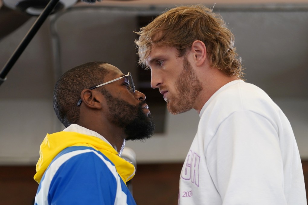 Former professional boxer Floyd Mayweather Jnr and YouTube star Logan Paul face off at Villa Casa Casuarina. Photo: USA Today
