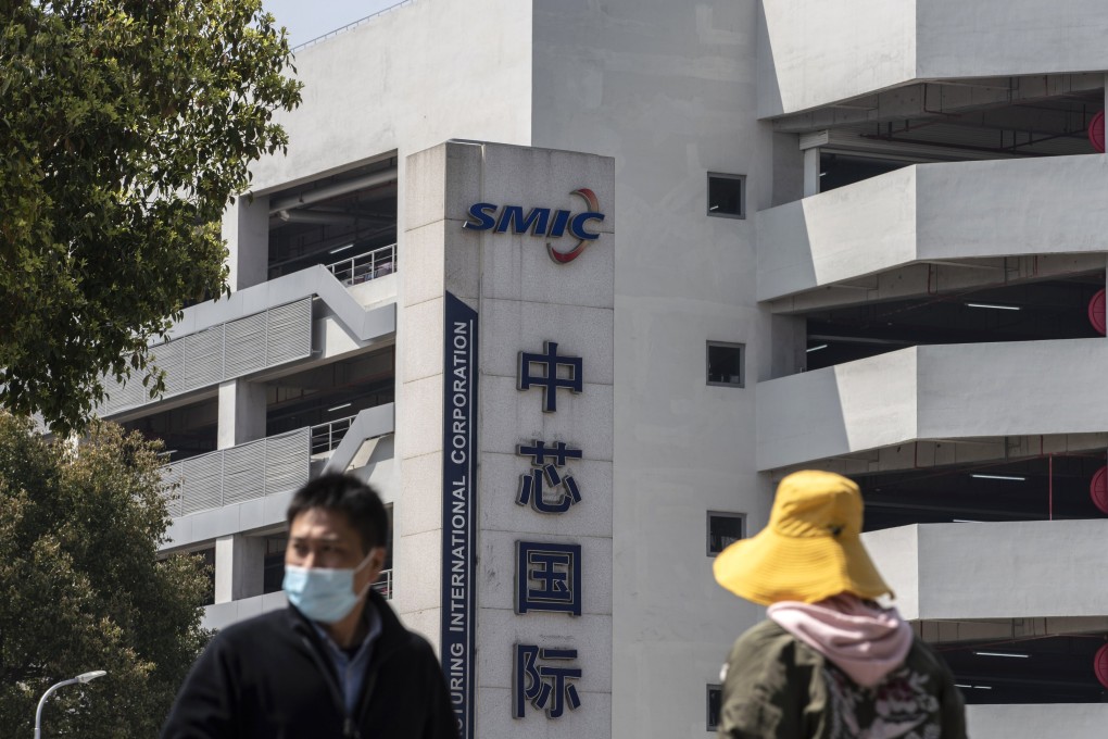 Pedestrians walk past SMIC headquarters in Shanghai, China, March 23, 2021. Photo: Bloomberg
