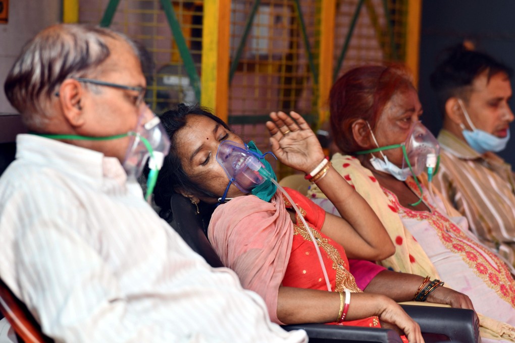 Covid-19 patients receive supplemental oxygen in Indirapuram, India, last month. Scammers have been targeting people desperately searching for oxygen, hospital beds and drugs. Photo: Xinhua