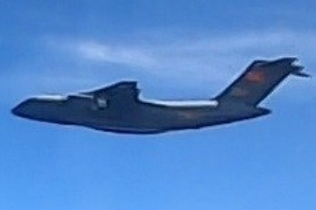 Malaysia’s air force released images of Chinese military transport planes seen near Luconia Shoals on Monday. Photo: Reuters