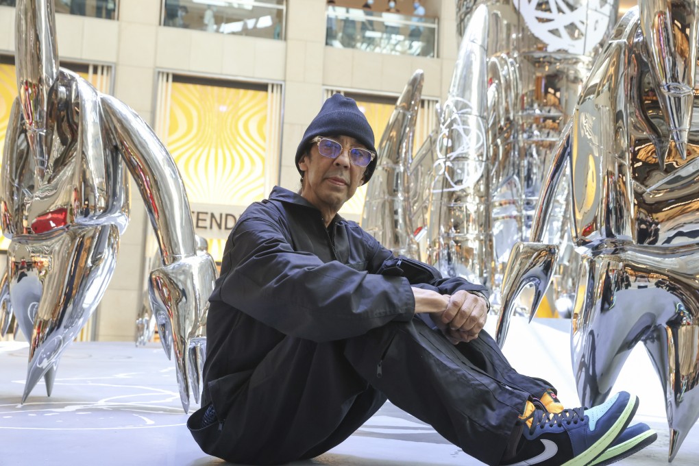 New York street artist Futura at the Landmark Atrium in a Central, Hong Kong shopping mall, where his six-metre rocket ship and “alien friends” have gone on display. Photo: K.Y. Cheng