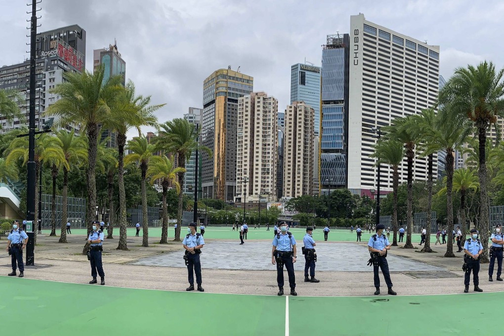 A group of police officers are seen in Victoria Park on Friday afternoon. Photo: Nora Tam