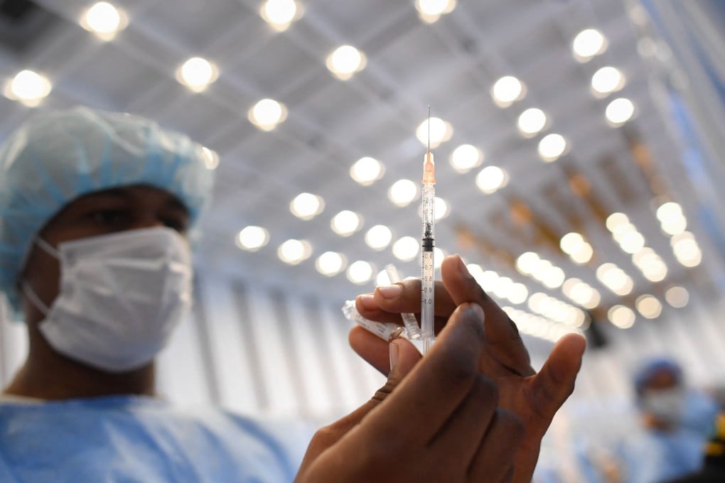 A health worker prepares a dose of the Sputnik V Covid-19 vaccine in Caracas, Venezuela. Photo: AFP