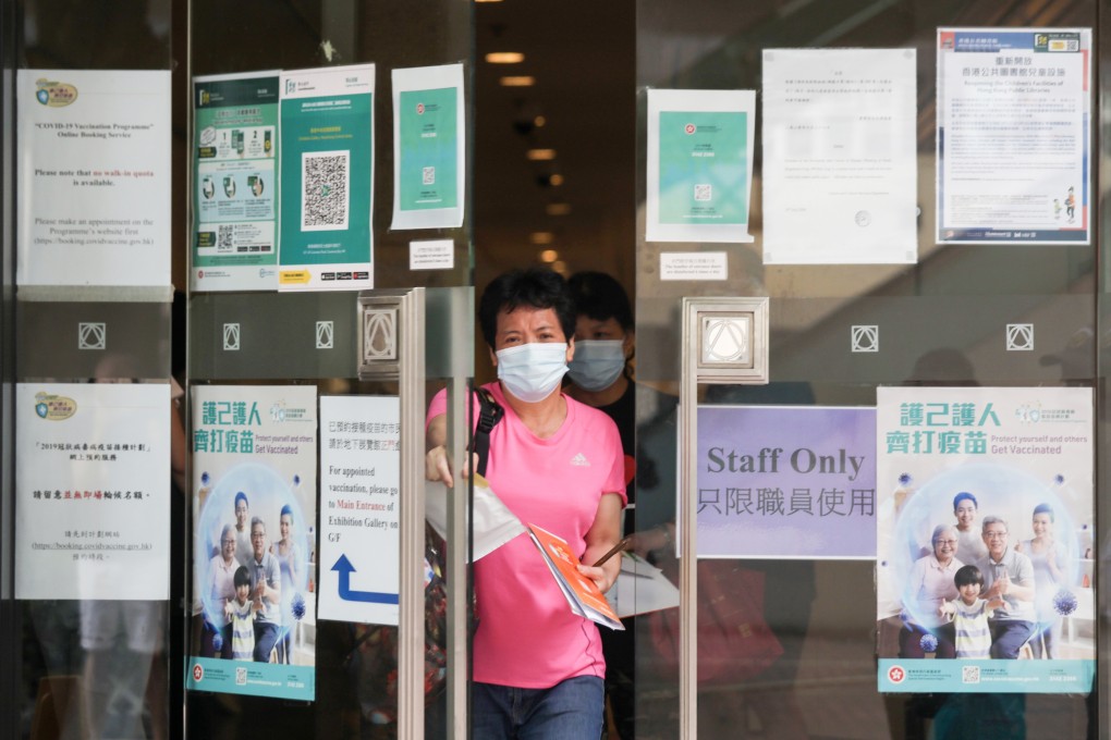 A woman comes out of Central Library in Causeway Bay after having her Sinovac jab. Photo: Xiaomei Chen