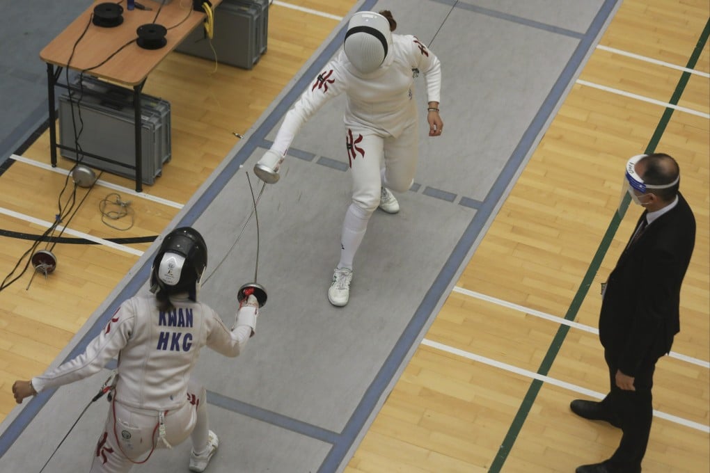 Kaylin Hsien (right) tussles with Kwan Yee-man in the President’s Cup at Hong Kong Park Sports Centre in Central. Photo: Xiaomei Chen