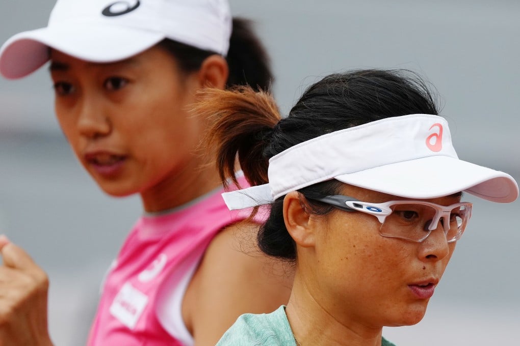 Chinese pair Zhang Shuai (left) and Xu Yifan react during their 2021 French Open women's doubles second round loss to Karolina Pliskova and Kristyna Pliskova of the Czech Republic. Photo: Xinhua
