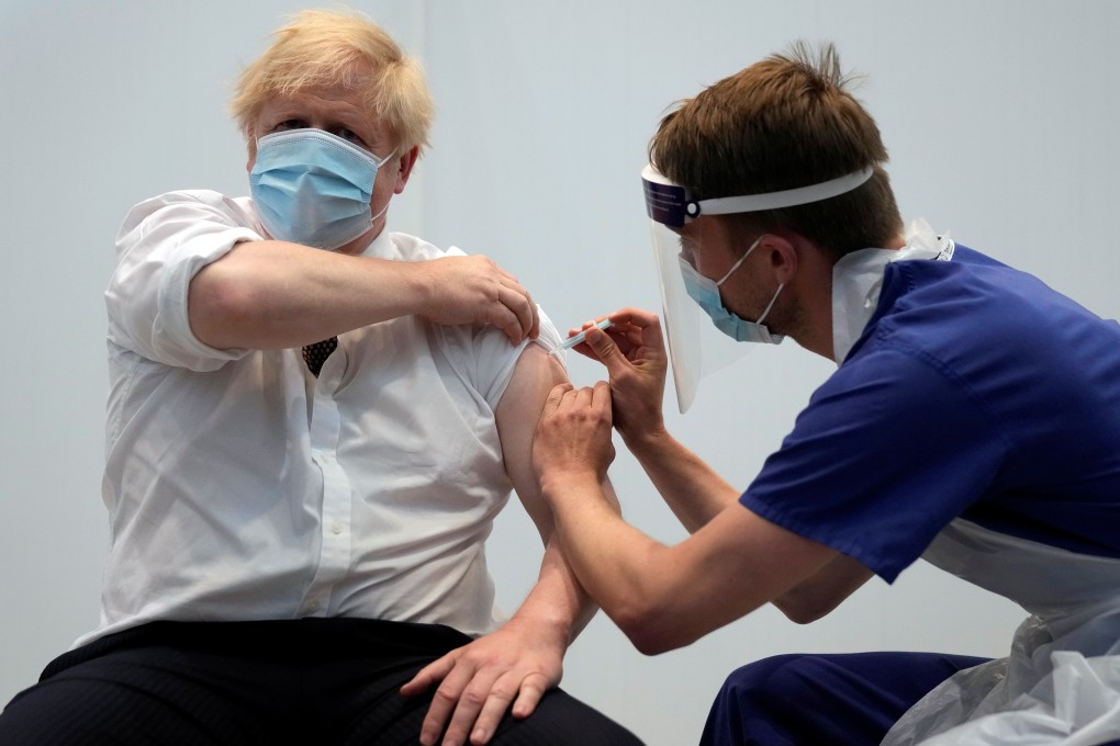 Britain’s Prime Minister Boris Johnson receives his second dose of the AstraZeneca coronavirus vaccine in London on Thursday. Photo: Reuters