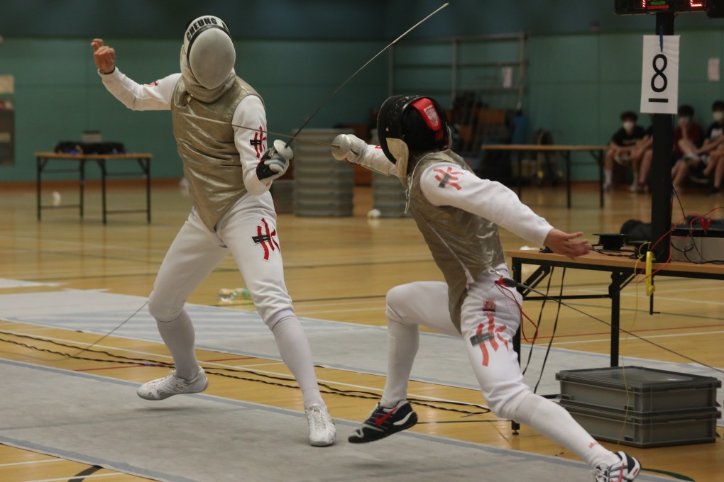 Cheung Ka-long (left) on his way to defeating Lawrence Ng in the men’s individual foil final at President’s Cup. Photos: Xiaomei Chen