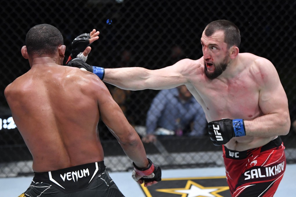 Muslim Salikhov punches Francisco Trinaldo in their welterweight fight at UFC Vegas 28. Photos: Jeff Bottari/Zuffa LLC