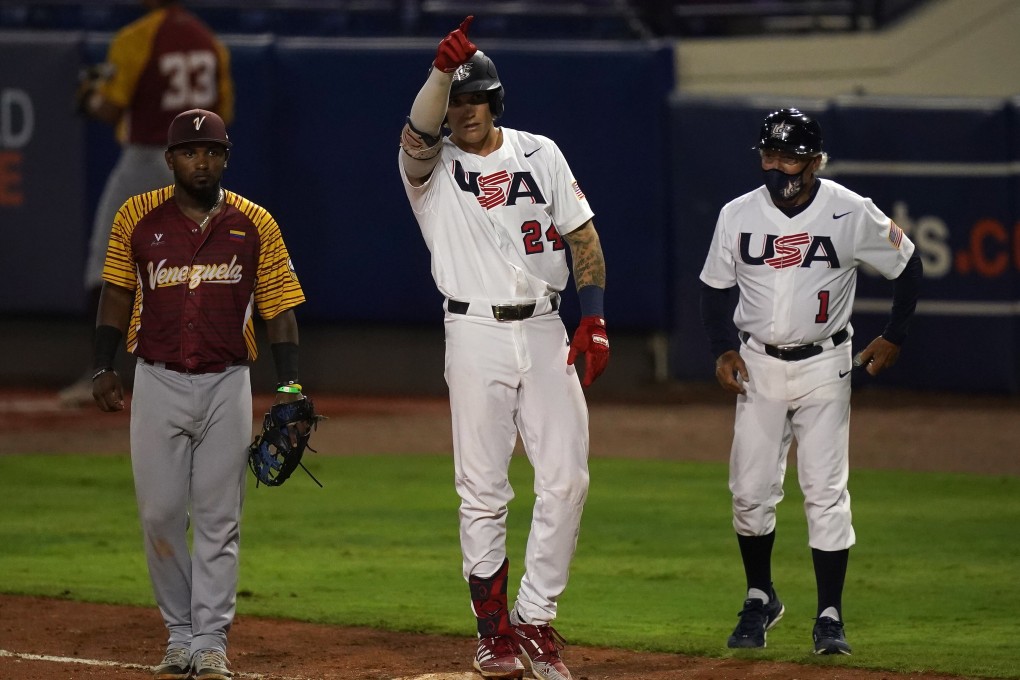 USA centre fielder Jarren Duran (24) gestures to the dugout after a single in the fifth inning against Venezuela. USA beat Venezuela to qualify for the Tokyo 2020 Games. Photo: USA Today