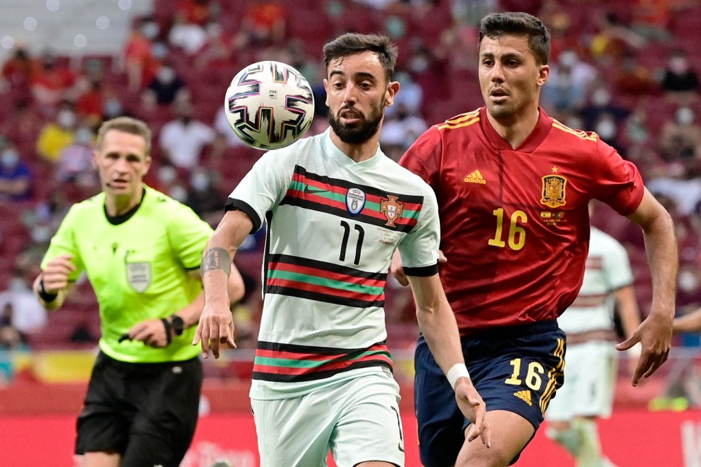 Portugal’s Bruno Fernandes (left) vies with Spain midfielder Rodrigo Hernandez during an international friendly in Madrid ahead of Euro 2020. Photo: AFP
