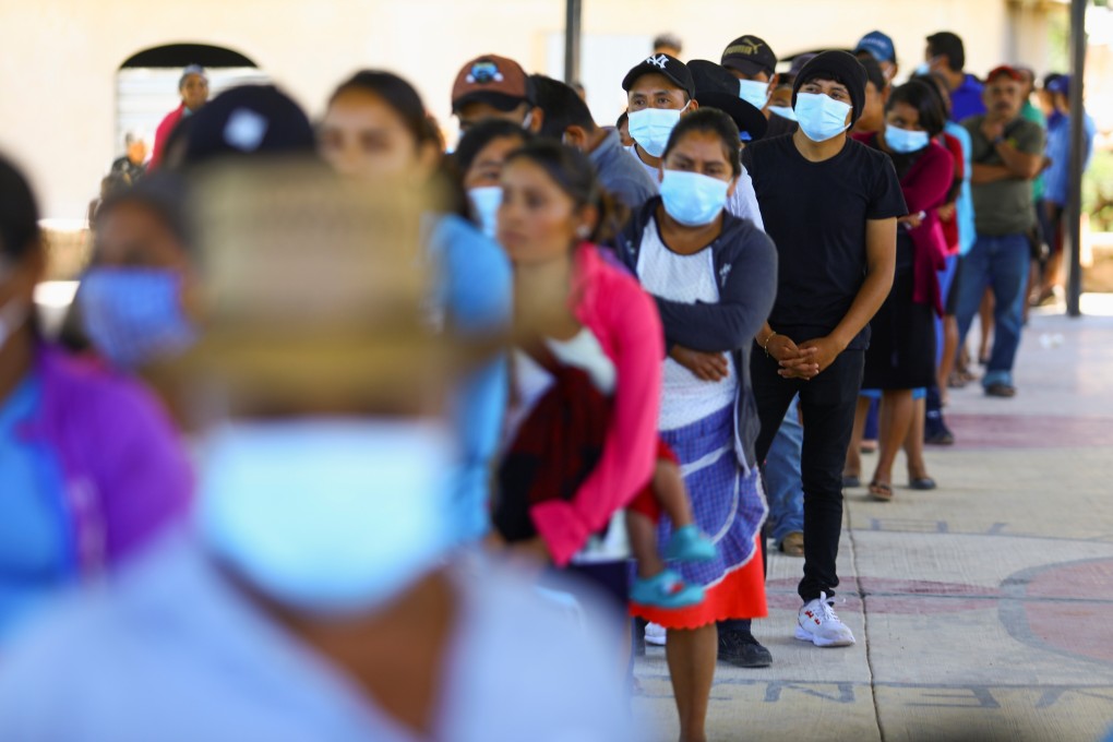 People queue to enter a polling station to vote during midterm election in Alyahualtempa, Guerrero state, Mexico on Sunday. Photo: Reuters