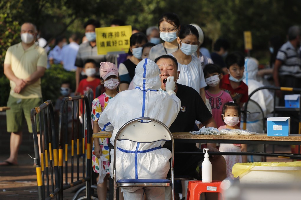 Local citizens line up to have nucleic acid testing at the Huadu District of Guangzhou city, China’s Guangdong province, on June 6, 2021. All people living in Huadu District of Guangzhou city are required to be tested. Photo: Imaginechina