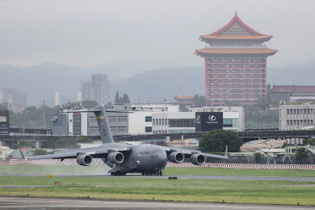A delegation of US senators arrive in a military plane at Taipei Songshan Airport on Sunday. Photo: Reuters