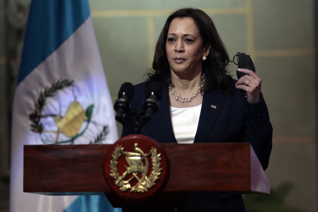 US Vice-President Kamala Harris removes her mask at the start of a news conference at the National Palace in Guatemala City on Monday. Photo: AP