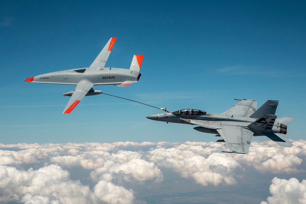 The Boeing MQ-25 T1 unmanned aircraft links up with an F/A-18 Super Hornet during the June 4 test flight. Photo: Boeing