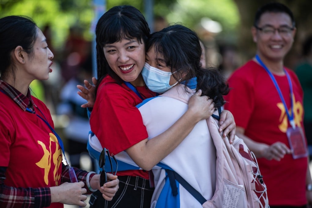 A student hugs her teacher at an exam centre in Guiyang, the capital of southwest China’s Guizhou province, on June 7, the first day of China’s annual college entrance exam. Photo: Xinhua