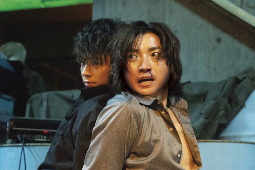 Tatsuya Fujiwara (right) and Ryoma Takeuchi in a scene from The Sun Stands Still (category IIB; Japanese), directed by Eiichiro Hasumi.