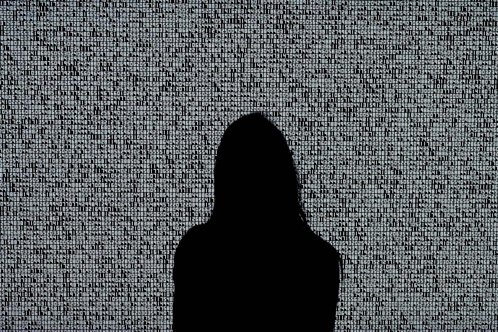 A woman looks at an NFT on June 4, 2021, at Sotheby's for the Natively Digital: A Curated NFT Sale Online Auction. NFTs act as certificates of authenticity for digital goods, and they have become big business. Photo: AFP