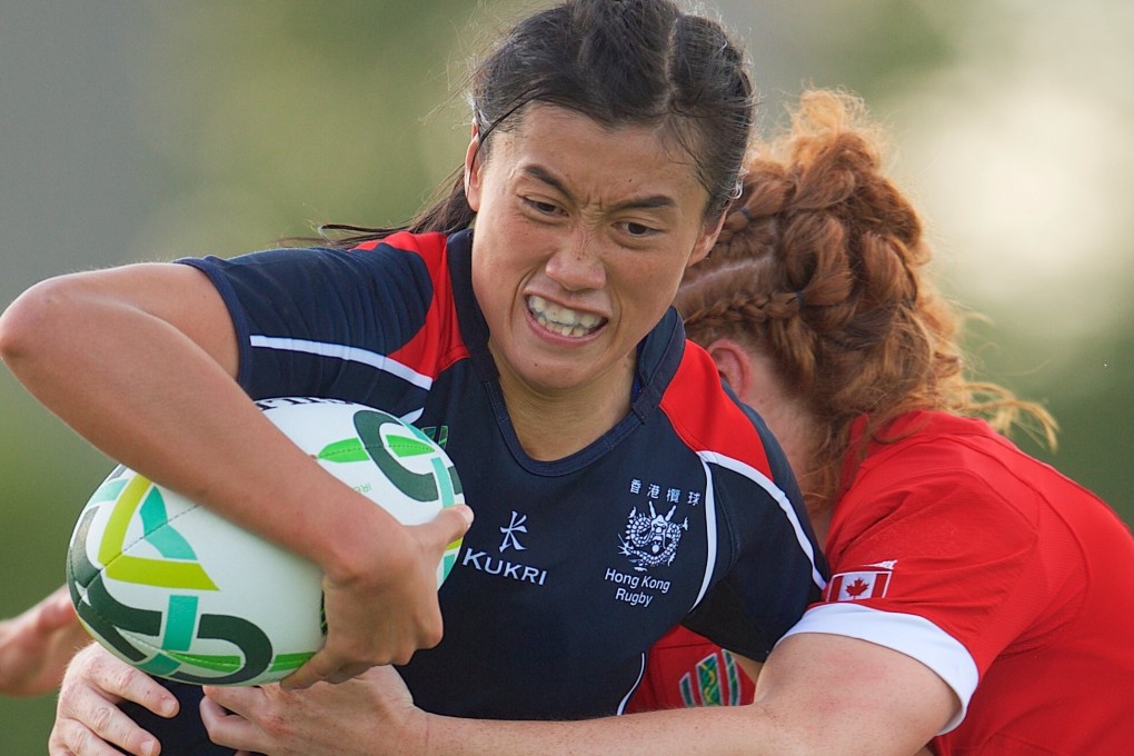 Hong Kong’s Chow Mei-nam takes the challenge to Canada at the 2017 Women’s Rugby World Cup. Photo: HKRU