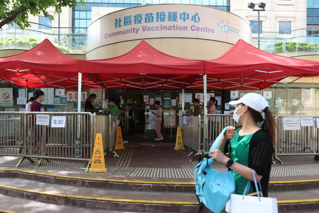 People queue up to have their vaccine jabs at Hong Kong Central Library in Causeway Bay. Photo: Xiaomei Chen