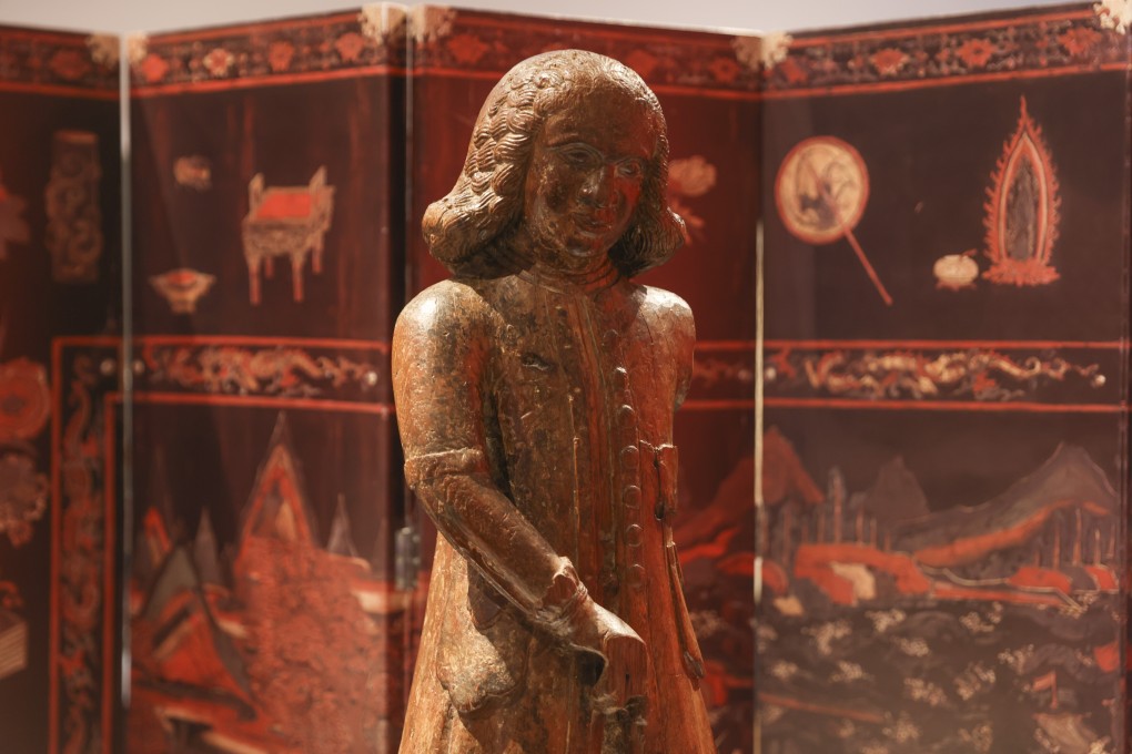 An 18th century carved wooden figure of a Dutch merchant shown as part of a new exhibition, Maritime Crossroads: Millenia of Global Trade in Hong Kong, at the Hong Kong Maritime Museum. Photo: Nora Tam