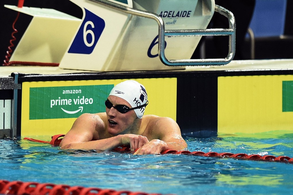 Mack Horton reacts after failing to qualify in the 400m freestyle final during day one of the Australian Olympic swimming trials in Adelaide. Photo: AFP