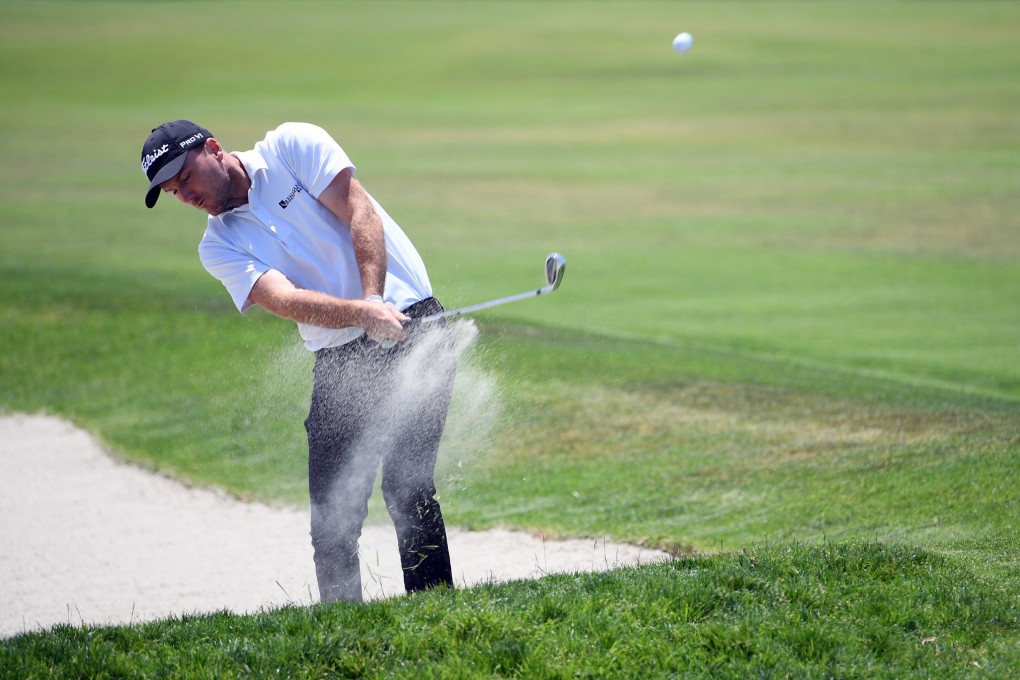 Russell Henley plays a shot from a bunker on the 17th hole during the first round of the US Open at Torrey Pines. Photo: USA Today