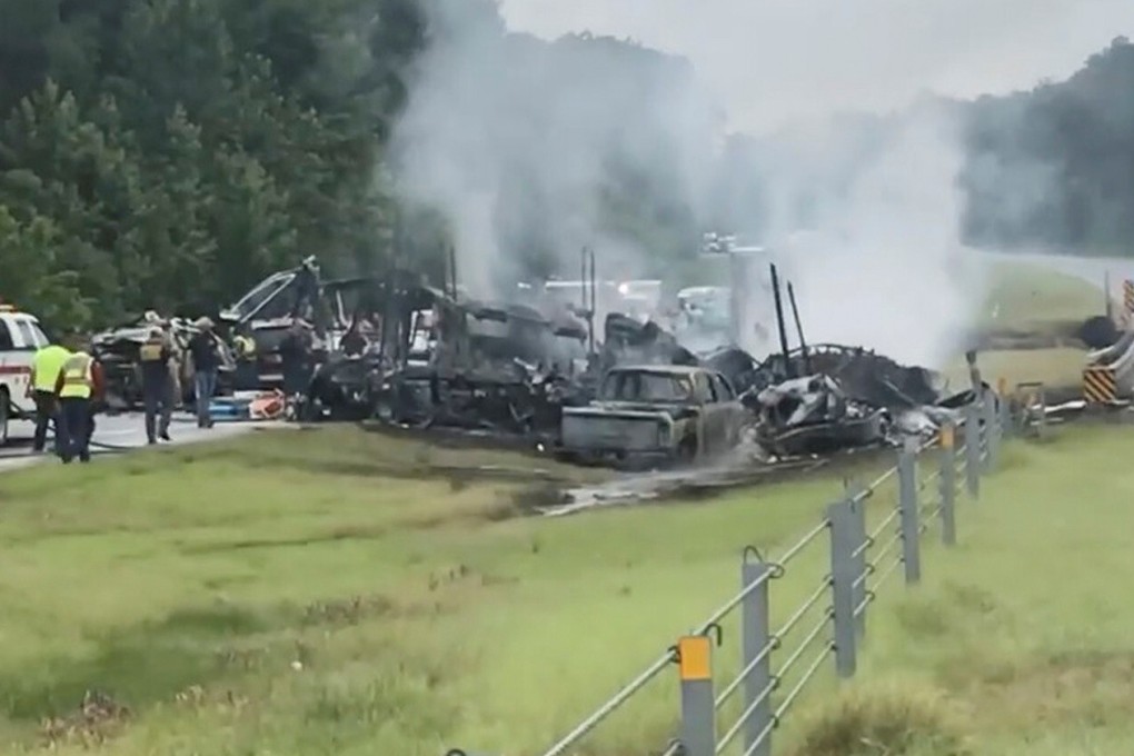Emergency personnel work at the accident site in Butler County, Alabama. Photo: Reuters