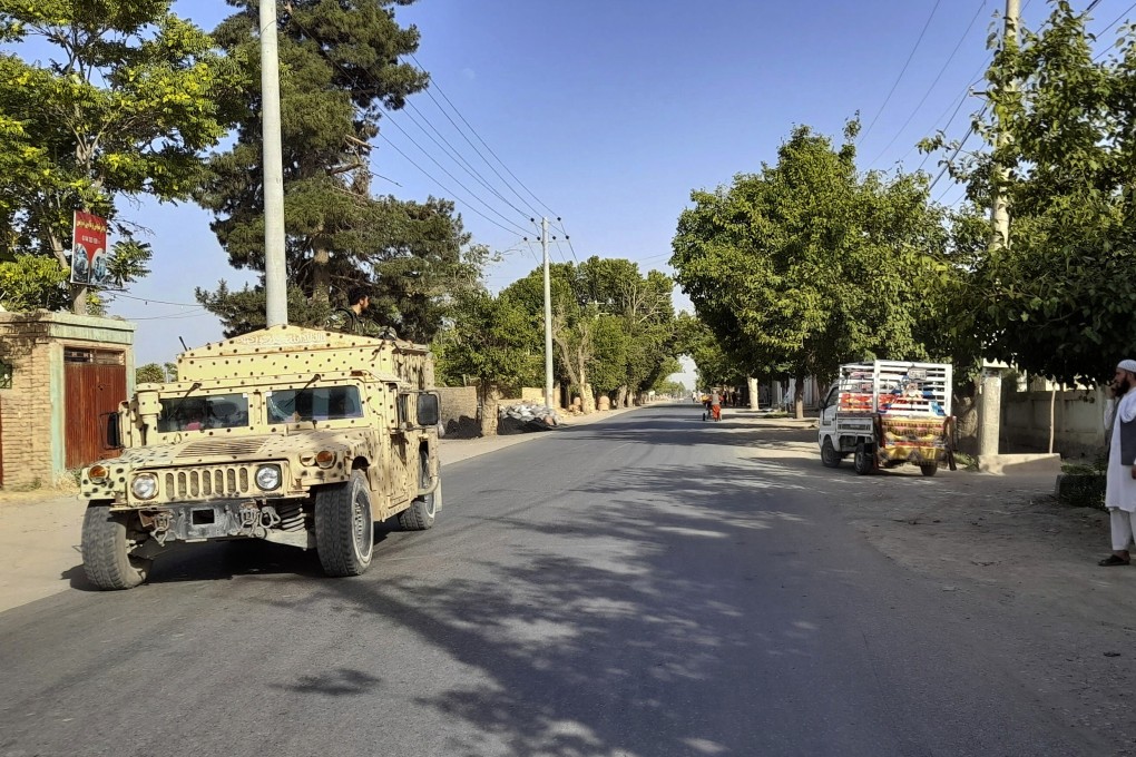 An Afghan army Humvee patrols in Kunduz city, north of Kabul, Afghanistan. Taliban fighters have encircled Kunduz, a provincial capital, police said. Photo: AP