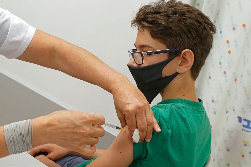 An Israeli teen receives a dose of the Pfizer-BioNTech Covid-19 vaccine in Tel Aviv. Israel was the first country to identify a possible link to heart problems. Photo: AFP