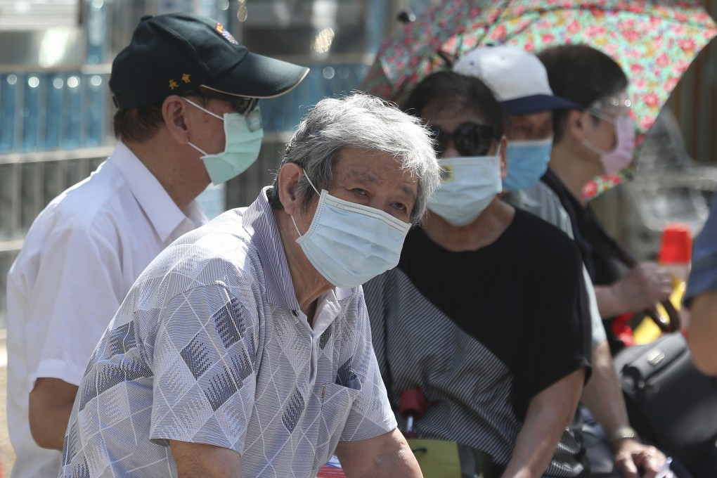 Elderly Taiwanese people line up to have the AstraZeneca Covid-19 vaccine at a primary school in Taipei. Photo: AP