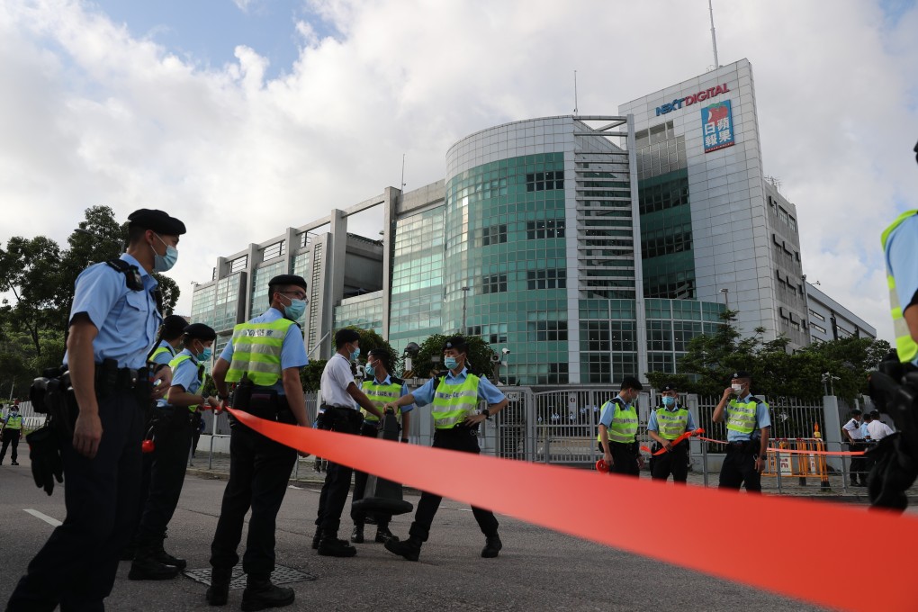 Police cordon off the Next Digital Limited building in Tseung Kwan O during a raid on the offices of Apple Daily. Photo: Sam Tsang
