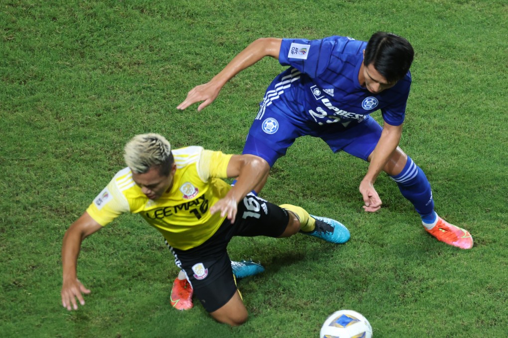 Lee Man’s Ngan Lok-fung and Eastern’s ’ Wong Wai battle it out during the AFC Cup at Hong Kong Stadium. Photo: K.Y. Cheng
