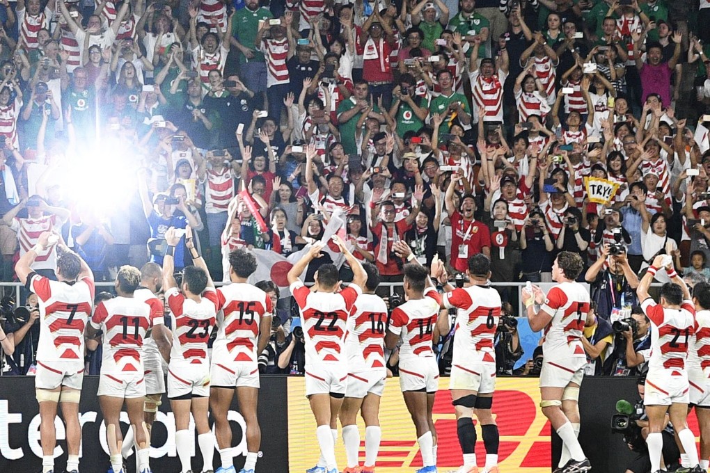 Japan players with the home fans after beating Ireland in a 2019 Rugby World Cup pool match in Fukuroi, Japan in 2019.