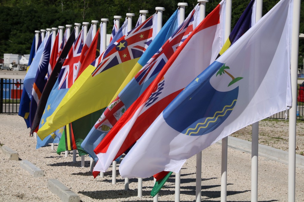 Flags from the Pacific Islands countries, which are facing being caught up in the increasing rivalry between China and the US. Photo: AFP