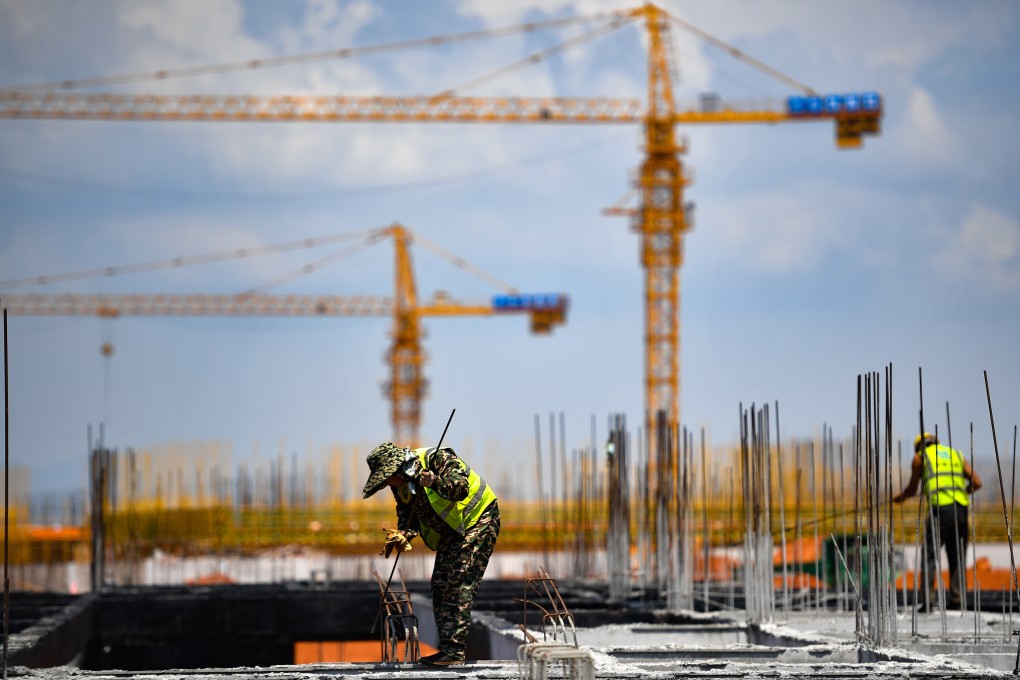 Investors are growing jittery about the risk of default among local governments, which borrowed huge sums for infrastructure projects via local government financing vehicles after the 2008 global financial crisis. Photo: Xinhua