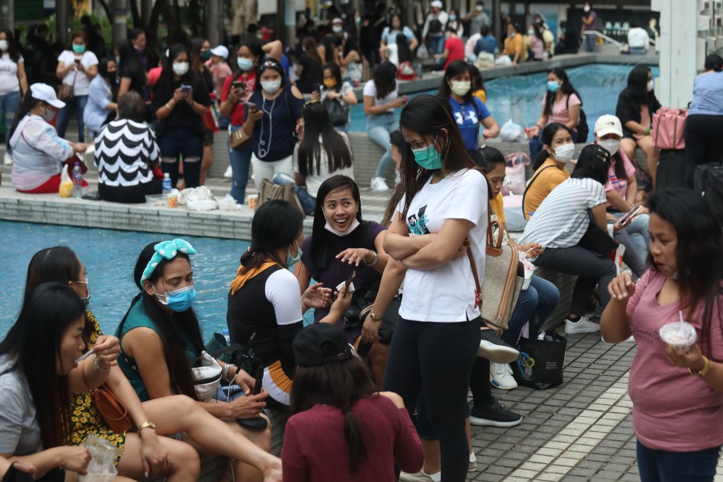 Domestic helpers enjoy their day off in Central. Photo: Xiaomei Chen