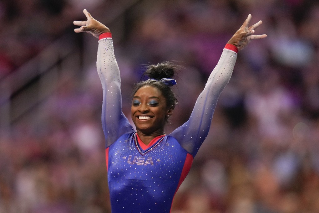 Simone Biles celebrates her performance on the vault during the women's US Olympic Gymnastics Trials. Photo: AP