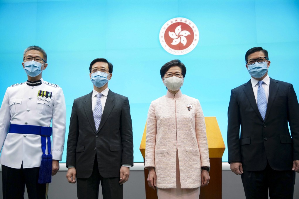(From left) New police commissioner Raymond Siu, Chief Secretary John Lee, Chief Executive Carrie Lam and security secretary Chris Tang meet the press. Photo: Winson Wong