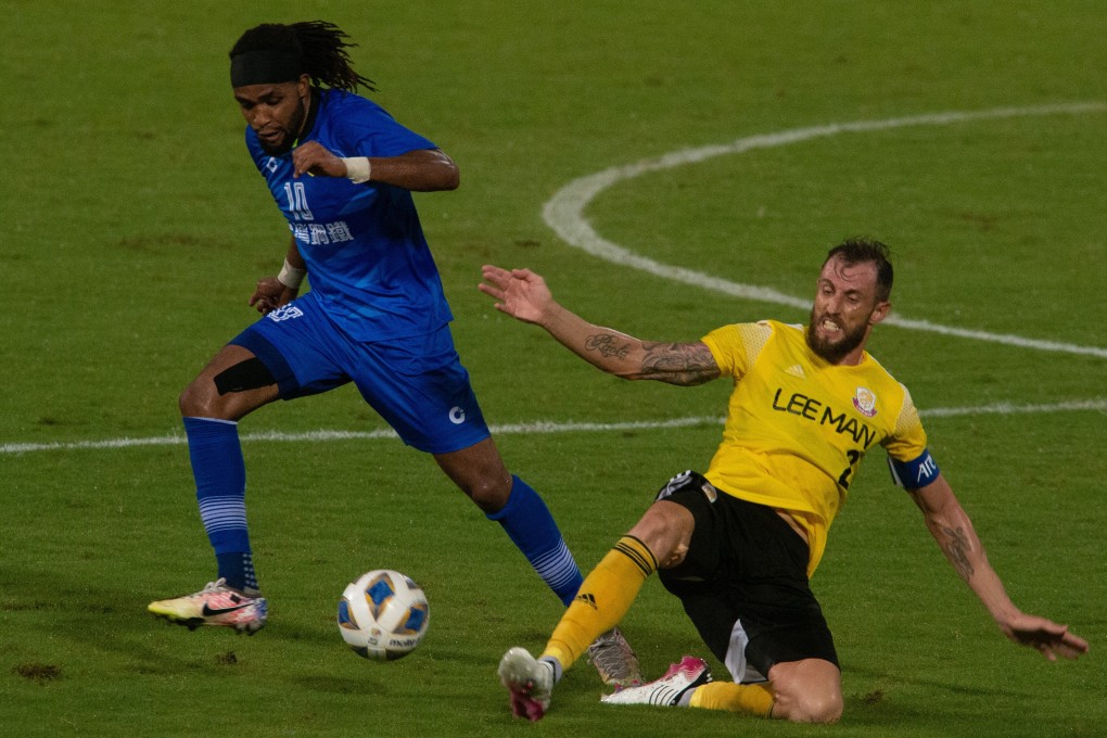 Hong Kong Premier League side Lee Man captain Fernando Recio challenges Benchy Estama of Taiwan's Tainan City in the AFC Cup at Tseung Kwan O Sports Ground. Photo: HKFA