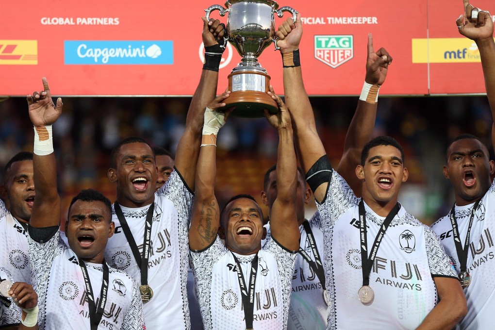 Fiji players celebrate winning the World Rugby Sevens Series trophy after a match against the US at the Waikato Stadium in New Zealand in 2019. Photo: AFP