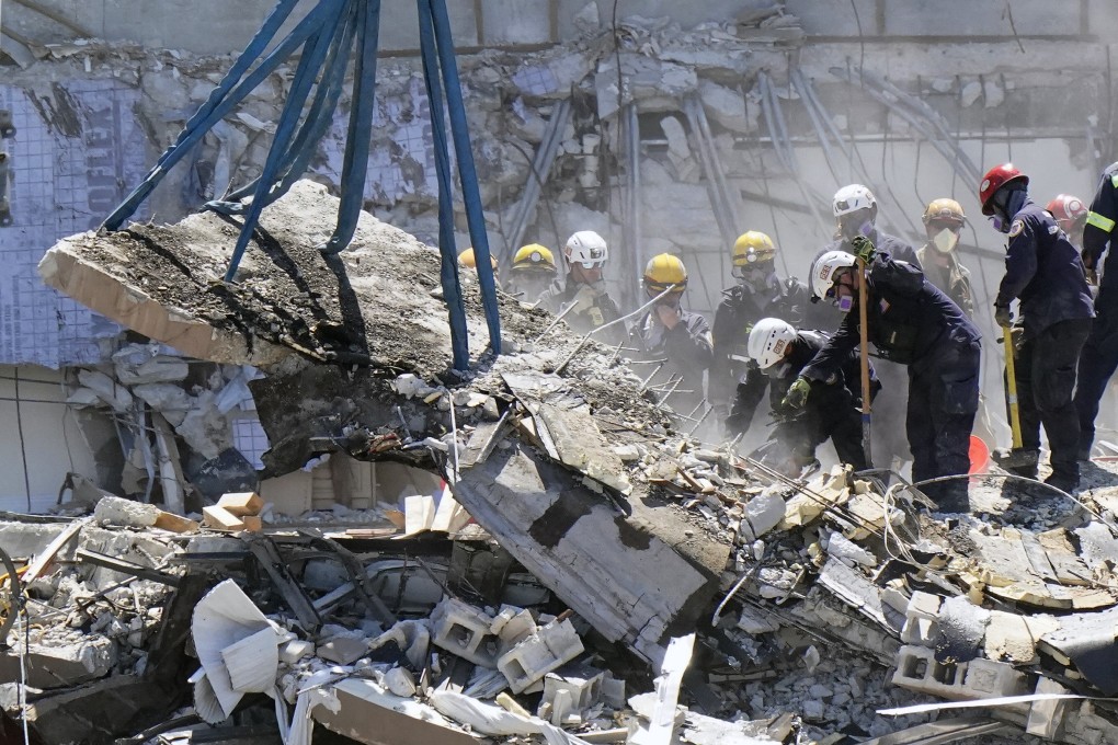 Crews work in the rubble at Champlain Towers South. Photo: AP