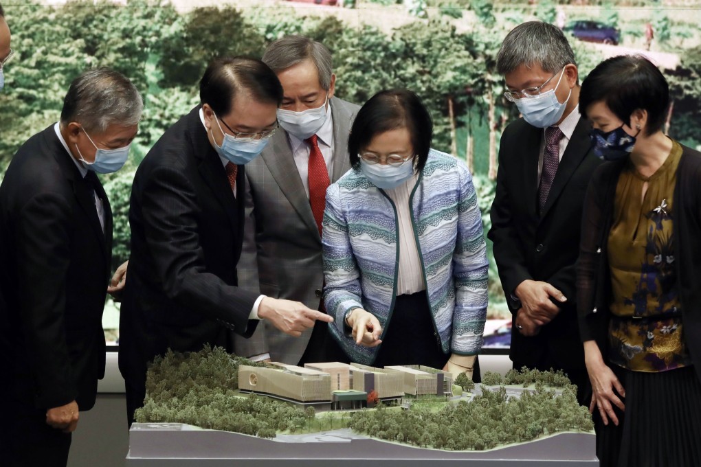 Senior officials, including health chief Sophia Chan Siu-chee (centre), attend a press event on the new hospital held at government headquarters on Monday. Photo: Jonathan Wong